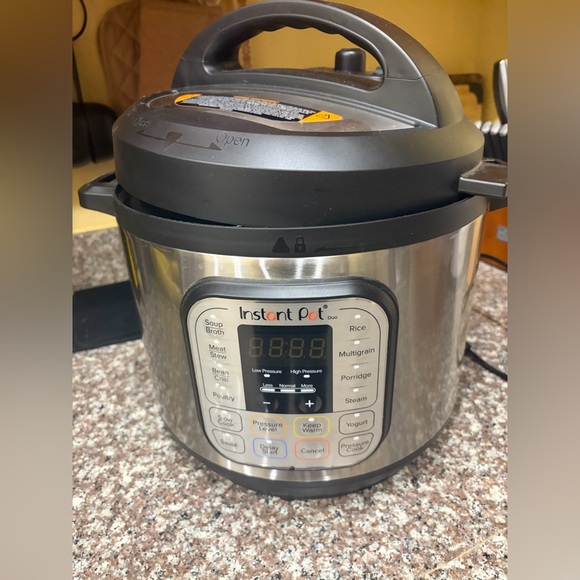 Instant Pot Multi-Function Pressure Cooker - Picture 1 of 5